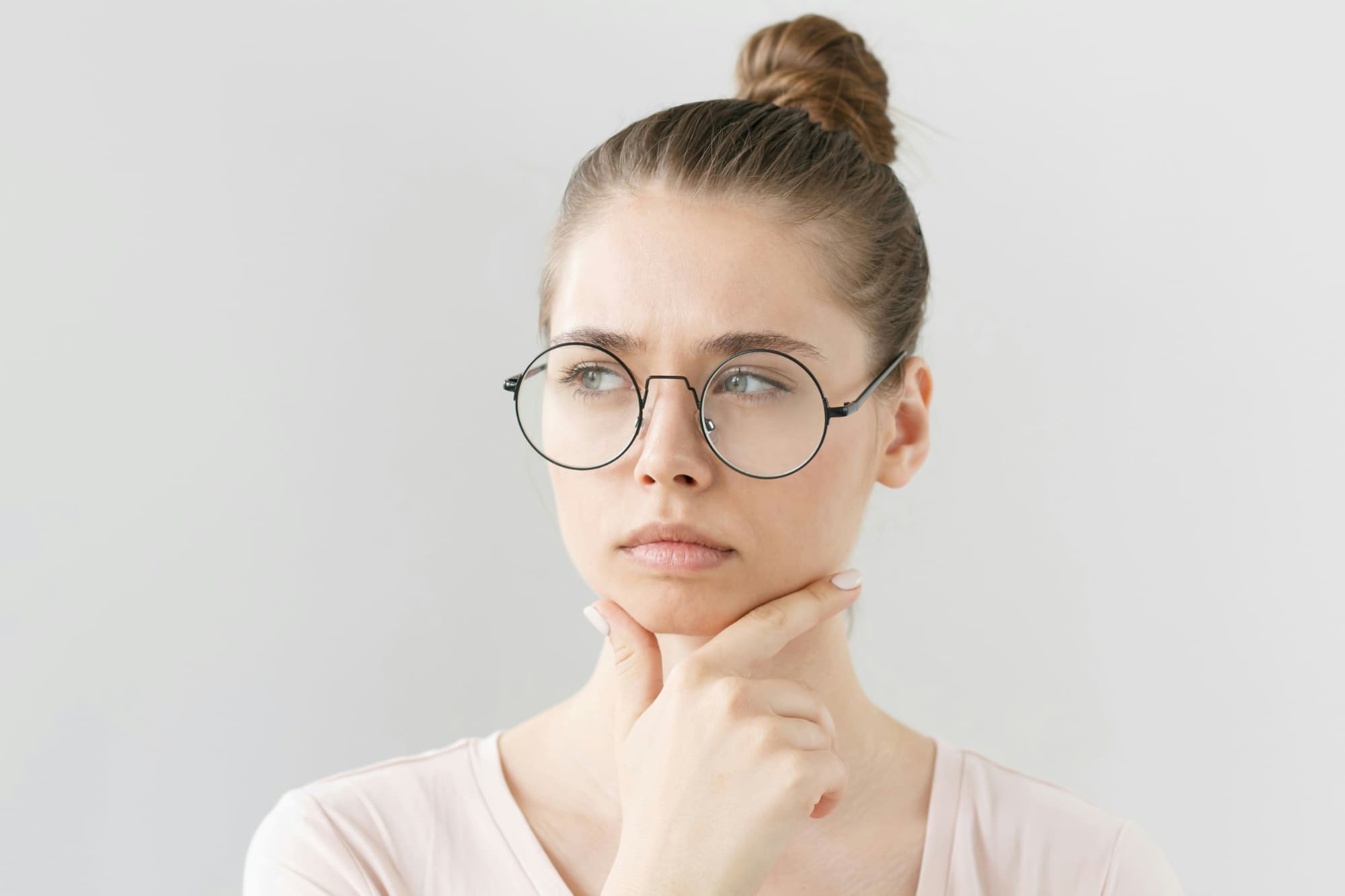 Not sure Close up of contemplative office worker's face.